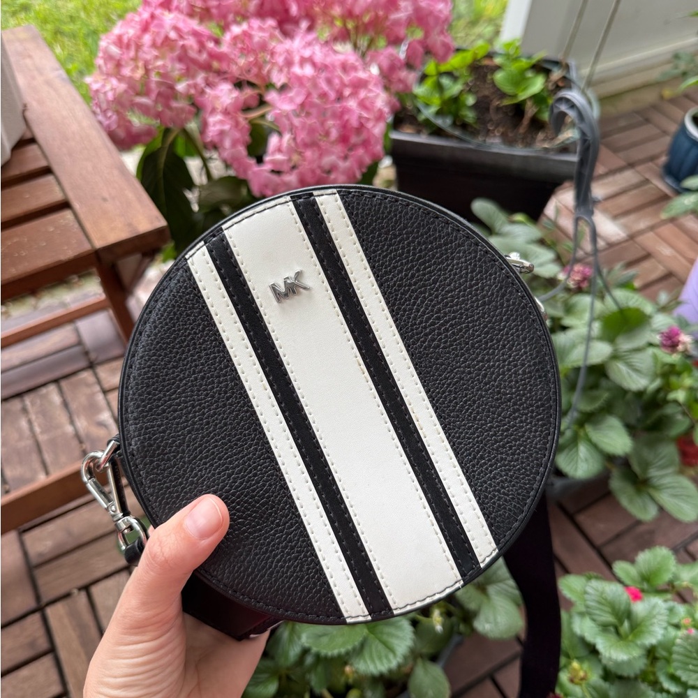 Michael Kors small circle crossbody black and while with stripe